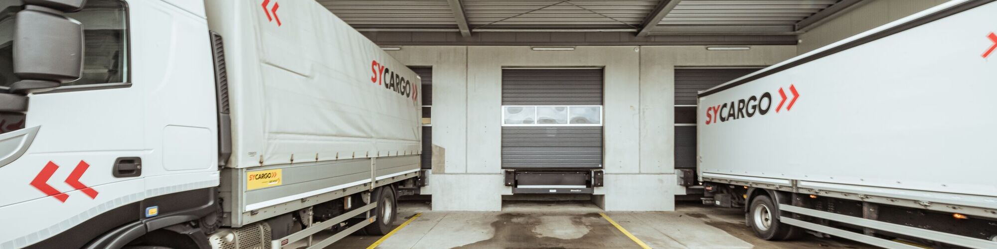 LKW an der Laderampe - Sycargo AG